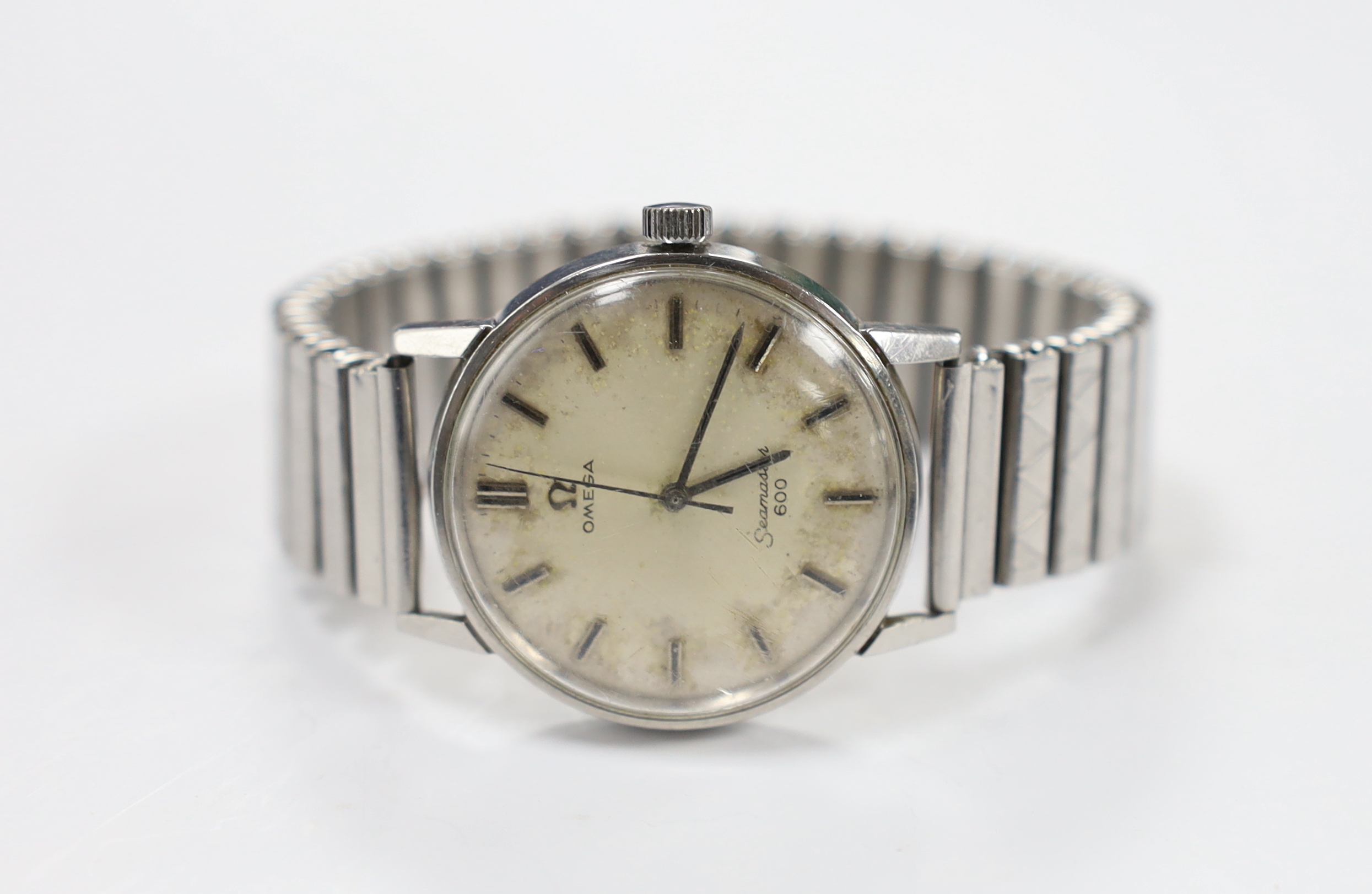 A gentleman's stainless steel Omega Seamaster 600 manual wind wrist watch, on associated flexible strap, case diameter 35mm.